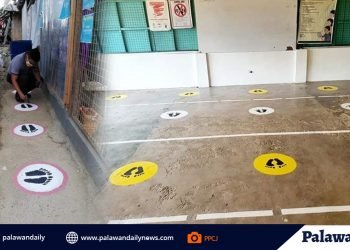 City Jail paints floor with circles to practice social distancing