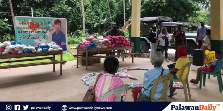 22-year-old Palaweño chooses to share his blessing with 300 beneficiaries