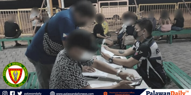 14 people were caught illegally entering Oriental Mindoro using fake travel documents despite travel restrictions